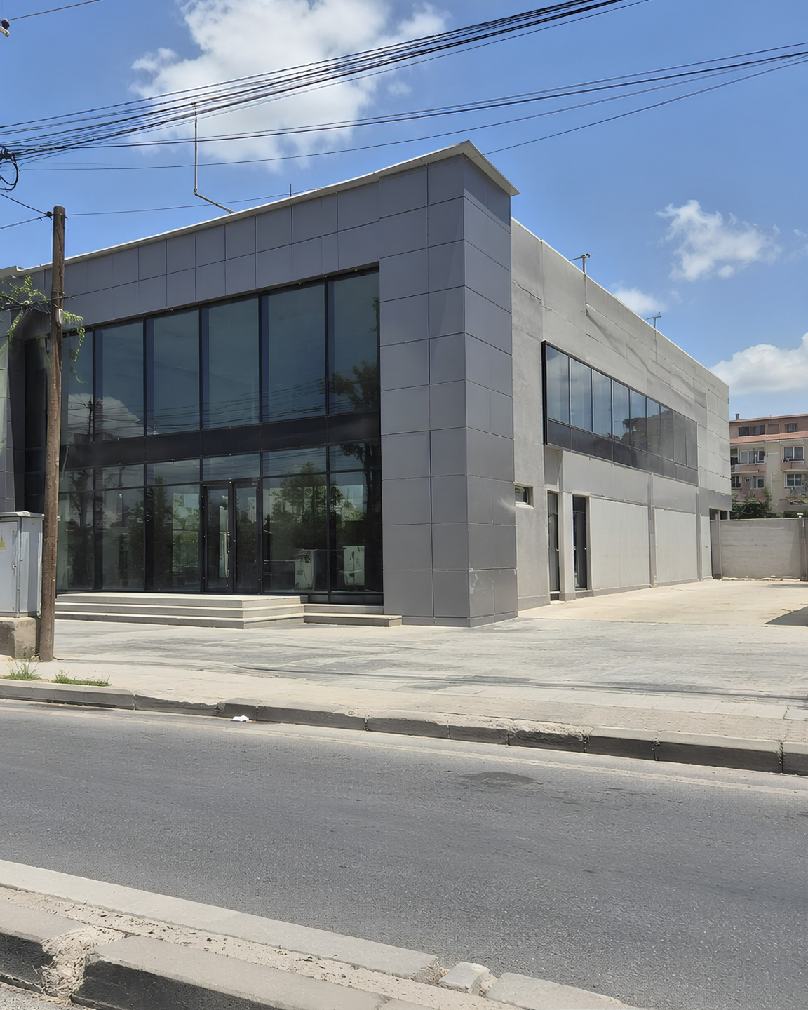 modern commercial building exterior street
